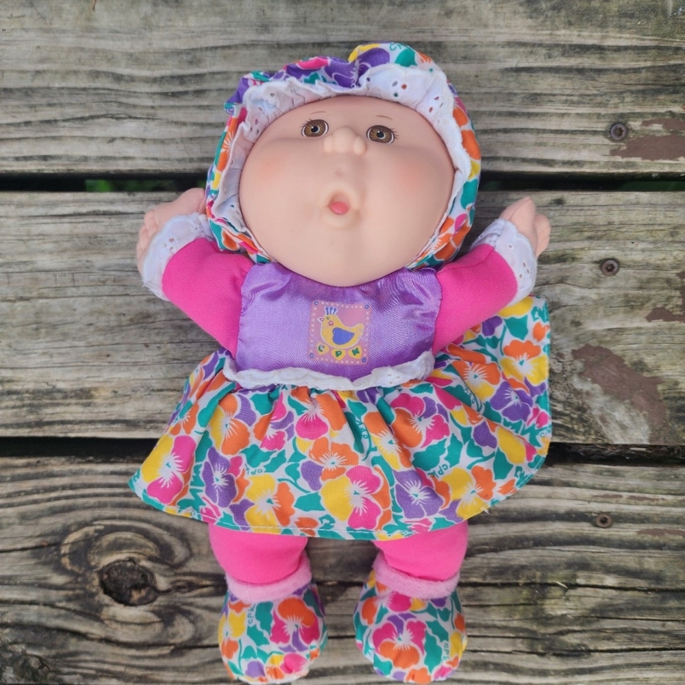 Mattel Baby Doll with Pink and Purple Floral Outfit